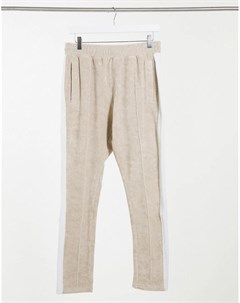Бежевые спортивные брюки от комплекта с контрастной вставкой The couture club