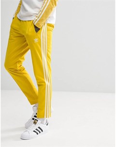 Желтые джоггеры скинни adicolor Beckenbauer CW1273 Adidas originals