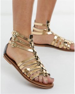 Золотистые кожаные сандалии гладиаторы с ремешками New look