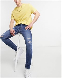 Темно выбеленные супероблегающие джинсы со рваной отделкой Youth 519 Levi's®