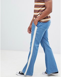Расклешенные джинсы с полосками по бокам Sacred hawk