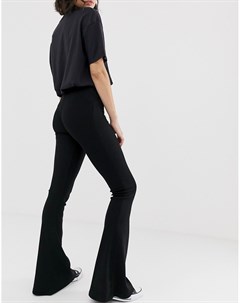 Трикотажные расклешенные брюки черного цвета в рубчик pacific Pull & bear