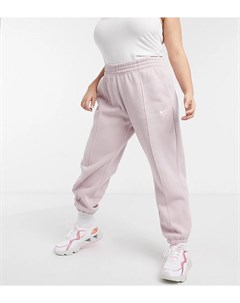 Джоггеры светло розового цвета в стиле oversized с маленьким логотипом галочкой Plus Nike