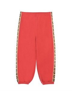 Красные спортивные брюки с лампасами Gucci