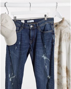 Узкие рваные джинсы Celio
