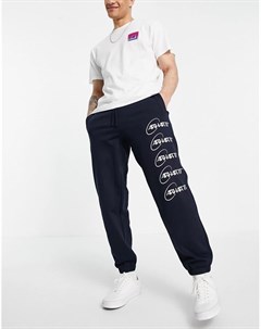 Темно синие спортивные штаны с логотипом орбитой Carhartt wip