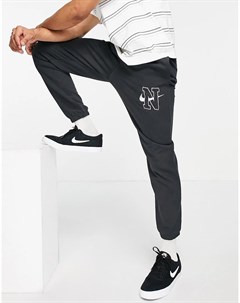 Черные выбеленные джоггеры широкого кроя с логотипом Retro Nike
