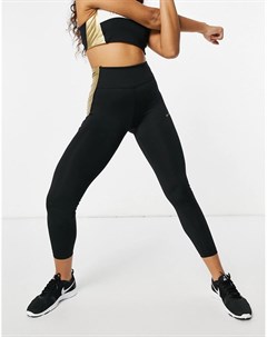 Черные с золотистой отделкой облегающие леггинсы one Nike training