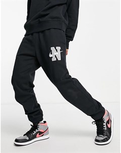 Черные джоггеры из плотного трикотажа с манжетами и логотипом Retro Nike