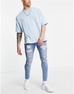 Голубые супероблегающие джинсы стрейч в винтажном стиле с рваной отделкой Asos design