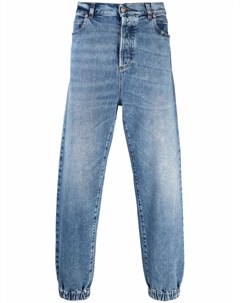 Узкие джинсы с эффектом потертости Balmain