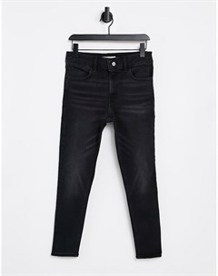 Зауженные джинсы черного выбеленного цвета Four Topshop