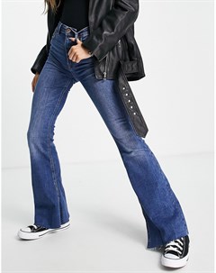 Эластичные расклешенные джинсы с разрезом по низу среднего синего цвета Stradivarius