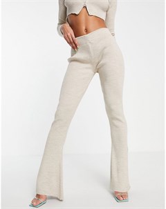 Трикотажные расклешенные брюки цвета экрю с разрезами от комплекта Fashionkilla