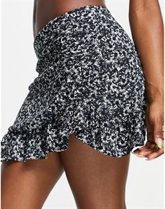Черная трикотажная мини юбка колокол с цветочным принтом Topshop