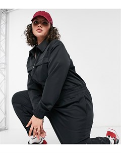 Черный комбинезон в утилитарном стиле с логотипом галочкой Plus Nike