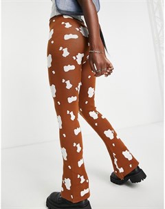 Свободные трикотажные брюки клеш с коровьим принтом от комплекта Daisy street