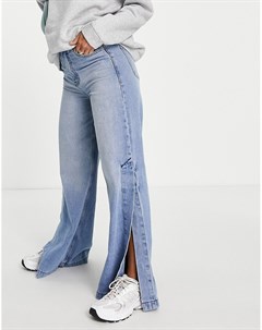 Светло голубые выбеленные джинсы в стиле 90 х с широкими штанинами и боковыми разрезами Dylan Dr denim