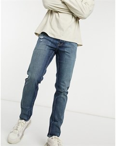 Эластичные узкие джинсы темно синего цвета с эффектом потертости Asos design