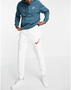Джоггеры белого с красным цвета с манжетами и логотипом Nike