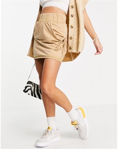 Трикотажная мини юбка светло бежевого цвета с рюшами на карманах Asos design