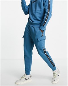 Голубые джоггеры в стиле карго с отделкой тесьмой с повторяющимся логотипом Nike