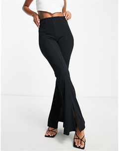 Черные расклешенные брюки в рубчик с разрезами спереди New look
