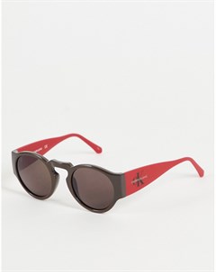 Круглые солнцезащитные очки бордового цвета Calvin klein jeans