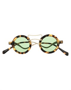 Солнцезащитные очки в круглой оправе черепаховой расцветки Miu miu eyewear
