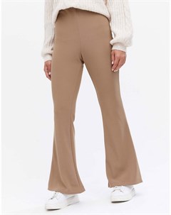 Серовато бежевые расклешенные брюки в рубчик New look