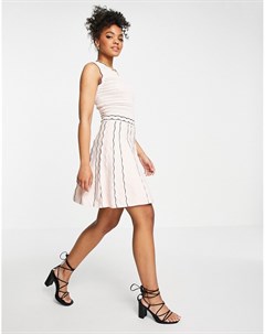 Бледно розовое трикотажное платье с короткой расклешенной юбкой и контрастными оборками Morgan