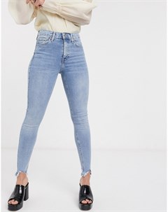 Выбеленные джинсы из переработанного смесового хлопка с неровным нижним краем штанин Topshop