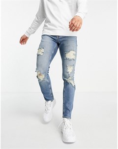 Эластичные застиранные джинсы узкого кроя со рваной отделкой Asos design