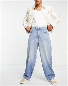 Выбеленные голубые джинсы свободного кроя из органического смесового хлопка с рваной нижней кромкой  Asos design