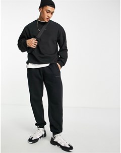 Премиум джоггеры черного цвета с нашивкой на штанине Trefoil Linear Adidas originals