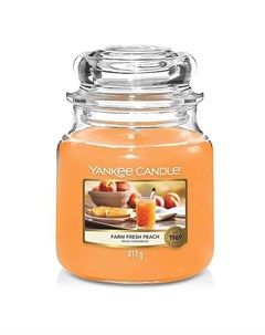 Свеча средняя в стеклянной банке Свежий персик Yankee candle