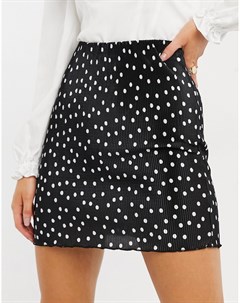 Плиссированная черно белая мини юбка в горошек с волнистым краем Asos design