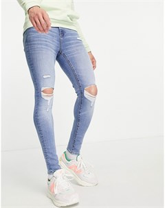 Эластичные джинсы выбеленного синего цвета с напылением дырками на коленях и потертостями Asos design