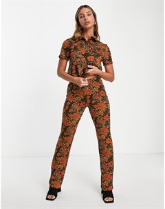 Трикотажные расклешенные брюки с цветочным принтом в стиле ретро от комплекта Vila