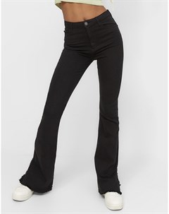 Черные эластичные расклешенные брюки с заниженной талией в стиле 90 х и разрезами по низу штанин Stradivarius