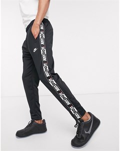 Черные джоггеры с фирменной лентой и кромкой манжетом Just Do It Nike