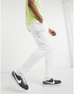 Белые джоггеры с манжетами Swoosh Pack Nike