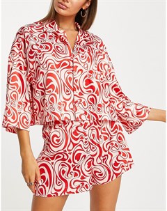 Атласный пижамный комплект из переработанных материалов розового и красного цвета с принтом завитков Monki