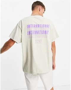 Светло бежевая футболка с принтом International на спине New look