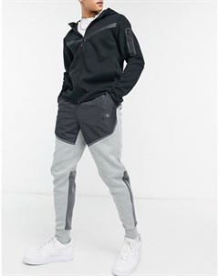 Серые флисовые джоггеры в дизайне колор блок Tech Fleece Nike