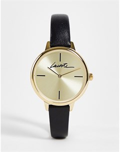 Часы с названием бренда золотистого и черного цветов Lacoste