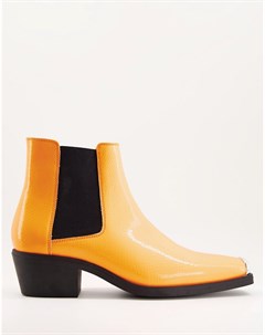 Оранжевые ботинки челси в стиле вестерн из искусственной кожи на кубинском каблуке с металлической о Asos design