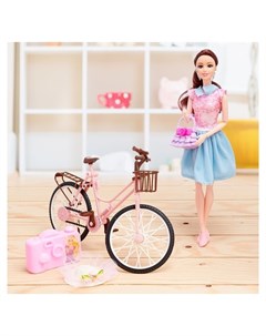 Кукла Юля на велосипеде с аксессуарами Кнр игрушки