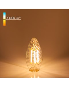 Светодиодная лампа Свеча витая F 7W 3300K E14 прозрачный BL1 Eurosvet