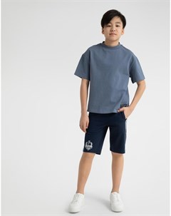 Темно синие спортивные шорты с лампасами для мальчика Gloria jeans